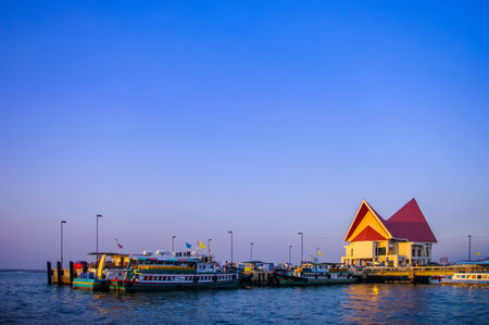 CHONBURI, THAILAND - DECEMBER 9 : Passenger ships at jetty with twilight sky on 9 December 2015 in Sriracha, Chonburi, Thailandのeditorial素材
