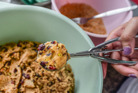 Nice cookie ingredient in scoop with handheld, Focus  at scoopの写真素材