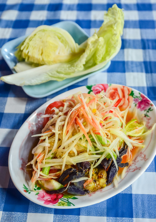 Spicy papaya salad with salted crab, Sum tum Thai foodの写真素材