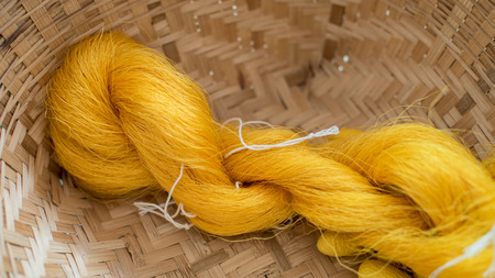 Colorful of Thai silk thread and silkworm cocoons nests
