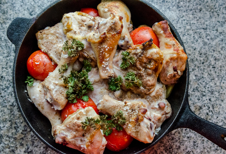 Chicken with herbal ready to roast in panの写真素材