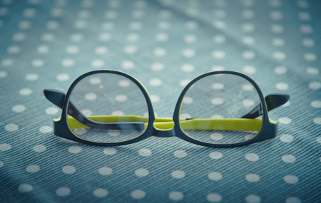 Eyeglasses with nice fabric in vintage color styleの写真素材