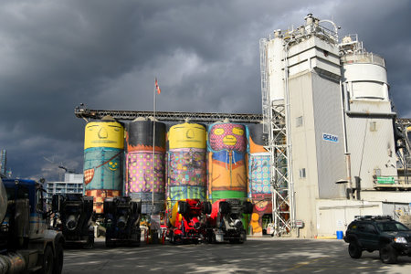VANCOUVER, CANADA - June 14 : 'Giants' Public Art painted on Concrete Silos by Brazilian Artists on 14 June 2018 in Granville Island, Vancouver, BC, British Columbia, Canadaのeditorial素材