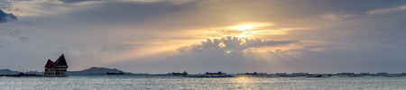 Panoramic view of sunset sky at  Sriracha city with Si Chang island background in Chonburi, Thailand