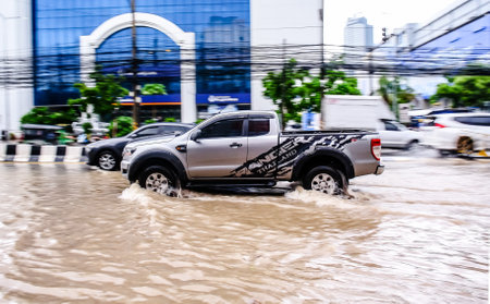 CHONBURI, THAILAND - 7 JUNE : Truck in flooding after rain at Sriracha city on 7 June 2019, Sriracha, Chonburi Thailandのeditorial素材