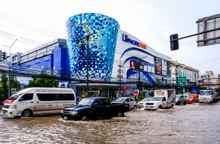 CHONBURI, THAILAND - 7 JUNE : Traffic with flooding after rain at Sriracha city on 7 June 2019, Sriracha, Chonburi Thailandのeditorial素材