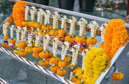 Garland of flowers hanging for worshipの写真素材