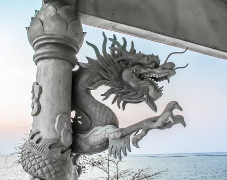 Chinese dragon sculpture with no colour paintedの写真素材
