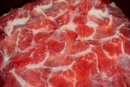 Raw slice beef in tray for cookの写真素材