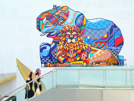 BANGKOK, THAILAND - 15 MARCH : Tourist walking on crossover with modern art at Bangkok Art and...
