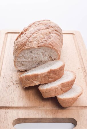 Sourdough Loaf sliced isolated on white backgroundの写真素材
