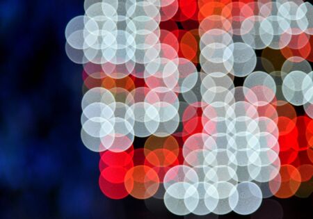 Abstract led lights bokeh pattern background at nightの写真素材