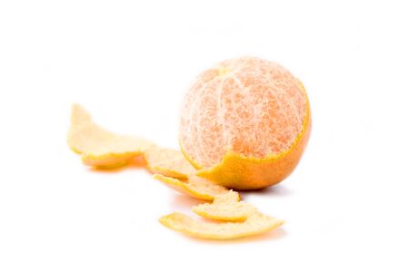 Peeled tangerine isolated on white backgroundの写真素材
