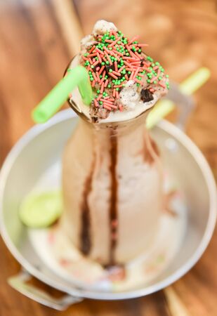 Chocolate smoothie with sweet topping decorate, High angle viewの写真素材