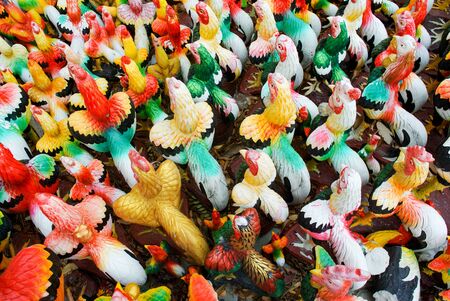 Chicken sculpture on ground at streetの写真素材
