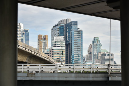 BANGKOK, THAILAND - 16 DEC : High-rise buildings with bridge foreground on 16 December 2018 in Bangkok, Thailandのeditorial素材