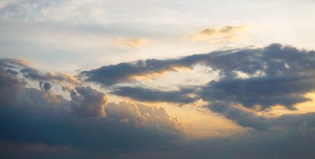 Nice clouds and sunset light reflection in skyの写真素材
