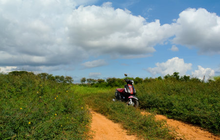CHONBURI, THAILAND - 20 MAY : Scooter parking at country road on 20 May 2020 in Sriracha, Chonburi, Thailandのeditorial素材