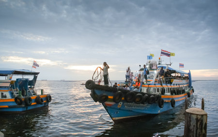 CHONBURI, THAILAND - 6 JULY : Ferry boat with passengers from Si Chang island are docking on 6 July 2020 in Sriracha, Chonburi, Thailandのeditorial素材