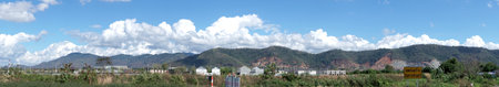 CHONBURI, THAILAND - 19 FEB : Panoramic view of village building under construction with quarry background on 19 February 2022 in Chonburi, Thailandのeditorial素材