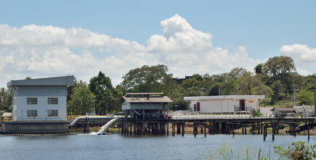 CHOUNBURI, THAILAND - 19 FEB : Water splashing out from water pump station at reservoir on 19 February 2022 in Bang-Pra reservoir, Chonburi, Thailandのeditorial素材
