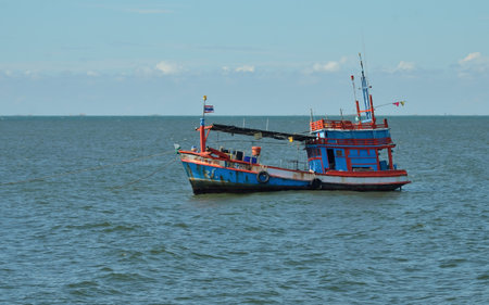 CHONBURI, THAILAND - 19 FEB : Fishing boat moored at sea on 19 February 2022 in Bangsaen, Chonburi, Thailandのeditorial素材
