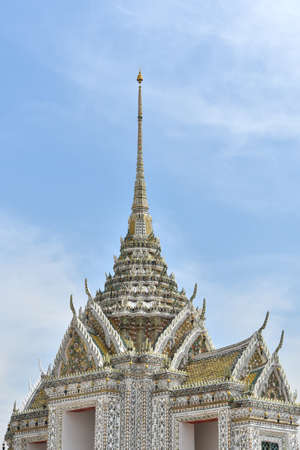 Top of building of Buddhist timeple at Wat Arun in Bangkok, Thailand (Thai architecture)の写真素材