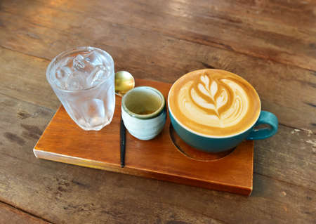 Latte coffee on wooden table, Coffee timeの写真素材