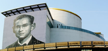 BANGKOK, THAILAND - 15 MARCH : KING RAMA IX portrait painted on bangkok art and culture centre facade building on 15 March 2019 in Bangkok, Thailandのeditorial素材