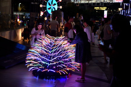 BANGKOK, THAILAND : 22 DEC : People photograph lighting art fixture at street on 22 December 2019 in Bangkok, Thailandのeditorial素材