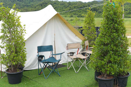 Camping background, Camping tents and chairsの写真素材