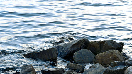 Sea surf with stone, Peaceful backgroundの写真素材