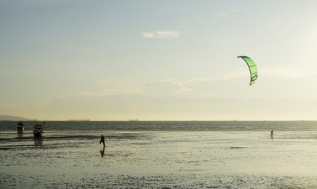 CHONBURI, THAILAND - 26 MARCH : Kite surf at sea with sunset sky background on 26 March 2022 in BangSaen, Chonburi, Thailandのeditorial素材