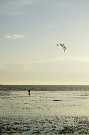 CHONBURI, THAILAND - 26 MARCH : Kite surf at sea with sunset sky background on 26 March 2022 in BangSaen, Chonburi, Thailandのeditorial素材
