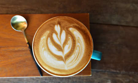 Latte coffee on wooden tray, Top viewの写真素材