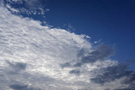 Nice clouds in blue sky backgroundの写真素材
