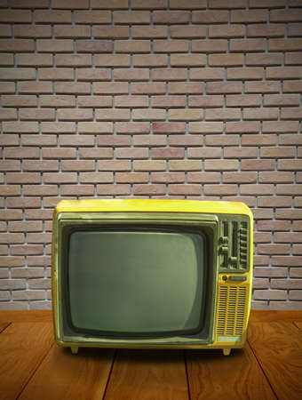 Vintage television on wooden deckの写真素材