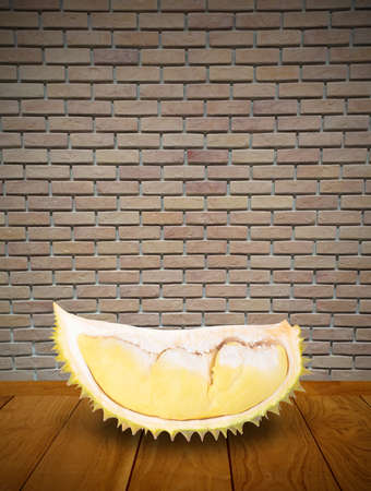 Sliced durian fruit on wooden deckの写真素材