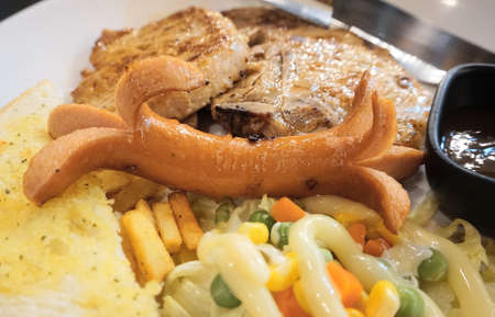 Steak and salad in white dish, Cuisine close up shotの写真素材