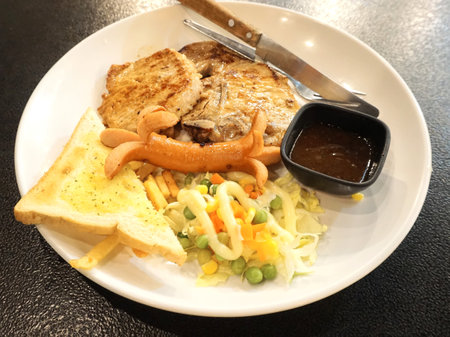 Steak and salad in white dish, Cuisineの写真素材