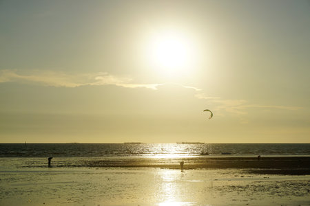 CHONBURI, THAILAND - 26 MAR : Kite surfer at sea on 26 March 2022 in Bangsaen beach, Chonburi, Thailandのeditorial素材