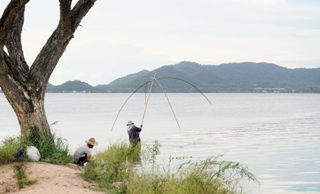 CHONBURI, THAILAND - 17 AUG : People with york fishing at lake on 17 August 2022 in Bang Phra, Siracha, Chonburi, Thailandのeditorial素材