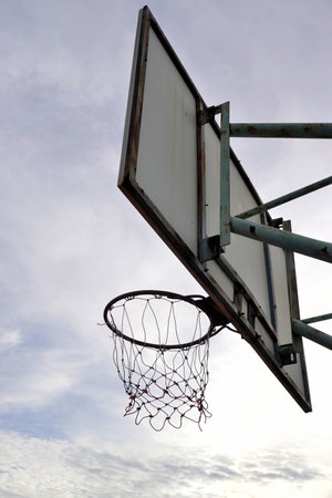 Basketball hoop with clouds skyの写真素材