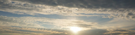 Panoramic view of sunrise sky with clouds at morningの写真素材