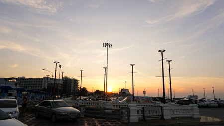 CHONBURI, THAILAND - 14 NOV : Sunset sky at outdoor parking beside sea on 14 November 2020 in Bangsaen, Chonburi, Thailandのeditorial素材