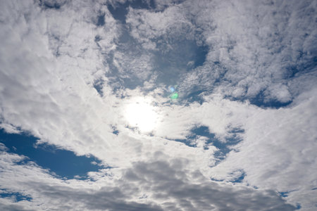 Clouds sky with sun, Nature backgroundの写真素材