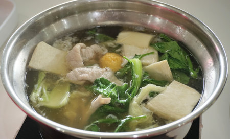 Boiled vegetable and pork in hot potの写真素材