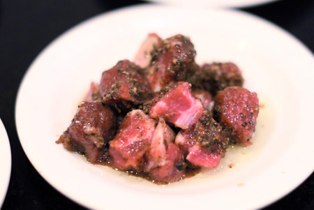 Raw meat in white dish for BBQの写真素材