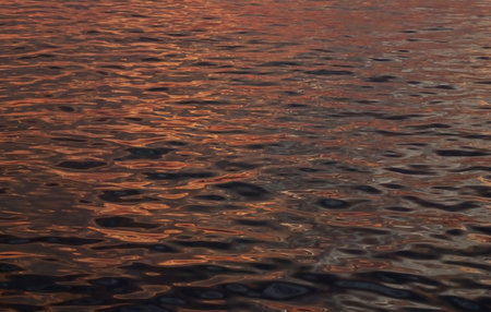 Sea surf with sunset light, Nature backgroundの写真素材