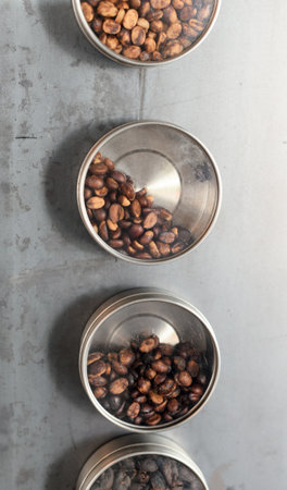 Roasted coffee  beans in round package at wallの写真素材